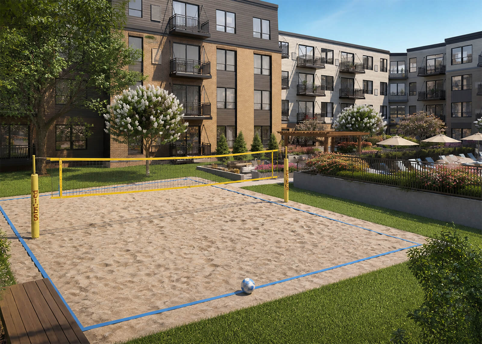 Sand volleyball court with apartment building, courtyard, pool area, pergola, and landscaped grounds